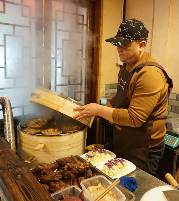 市井烟火气 人情味与美食的执着 唐记久酒牛肉馆