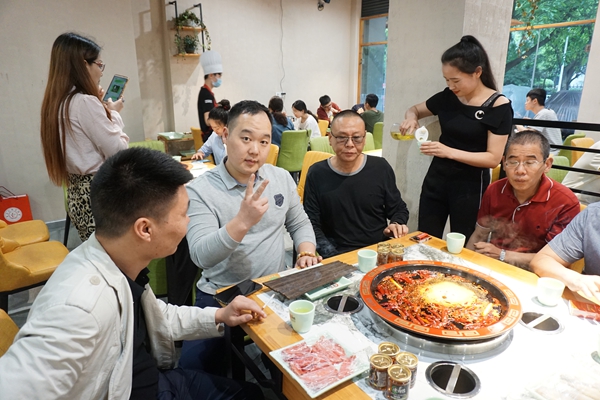 加强交流为促进重庆中小型火锅企业发展尽一份力